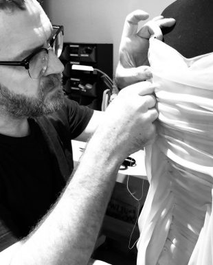 Man making a dress