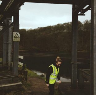 Rachel on site in a high vis